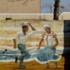 A mural of two people dancing 