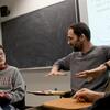 A Temple math professor is talking to his students in a classroom.