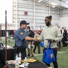 Law enforcement professional speaks to a Temple student interested in entering the field.