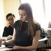 Temple students follow along closely during class discussion.